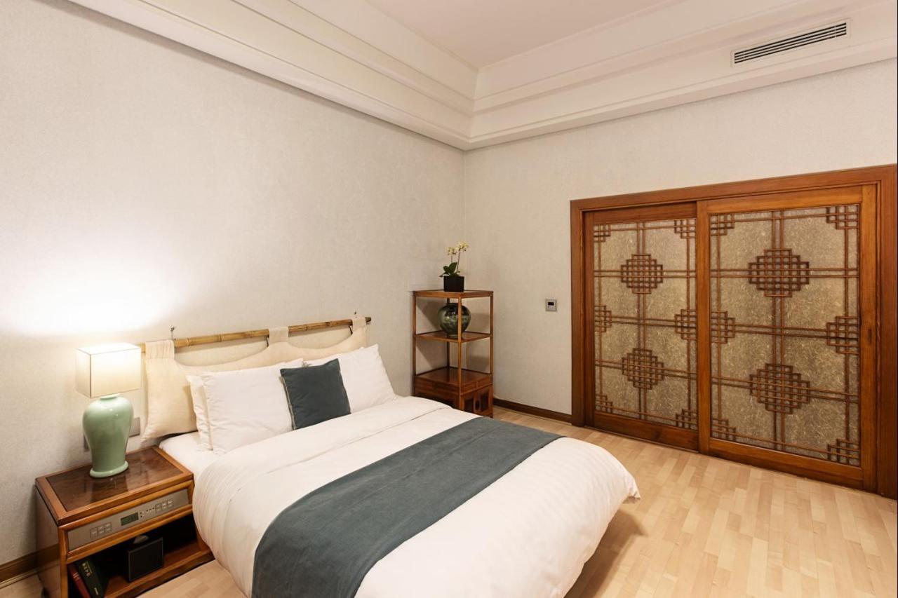 Haeundae Grand Hotel Busan Luaran gambar A bedroom at the hotel